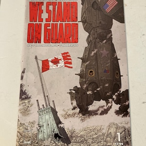 Può includere: Copertina del fumetto "We Stand on Guard" con un titolo rosso e bianco. L'immagine presenta una grande figura robotica con una bandiera americana, una bandiera canadese e un edificio distrutto. Il fumetto è il numero 1.
