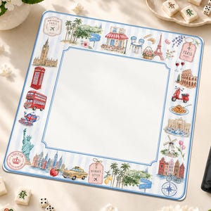 May include: A square game mat featuring a white center bordered by illustrations of global landmarks including the Eiffel Tower, Big Ben, the Statue of Liberty, and Hollywood signs, set against a light blue and white vertical striped background.
