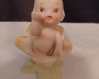 Vintage Kewpie doll figurine.