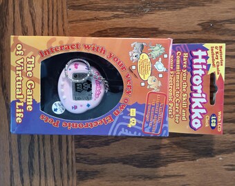 SKU B646P6716 TA8 | Original 1997 Bandai's Tamagotchi Virtual