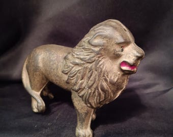 Antique cast iron lion bank.