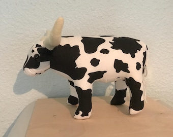 Pluche zwart-witte longhornkoe