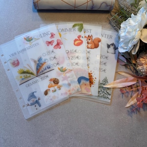 A6 Sparchallenge Jahreszeiten | Handmade | Motivierende Geldspar-Challenge | Geschenkidee | Sparspiel |  Umschlagmethode | Budgetieren