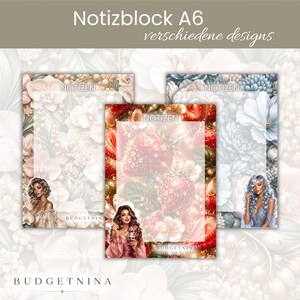 May include: Three A6 notepad sheets featuring floral and strawberry patterns with the text NOTIZEN and BUDGETNINA. The designs include illustrations of people, white orchids, blue flowers, and red strawberries, all with a central blank writing area.