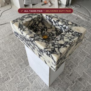 Handcarved Calacatta Viola marble wall mounted sink by Marblyart, custom made to order — photo 1 of 14