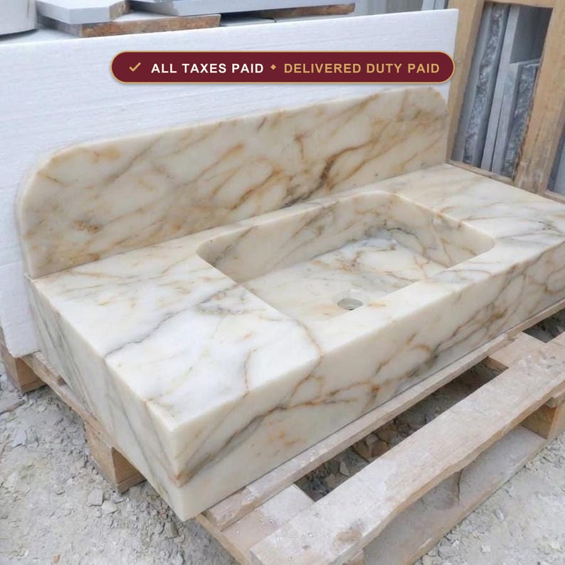 Handcarved Calacatta Gold marble floating vanity sink by Marblyart, custom made to order — photo 1 of 14