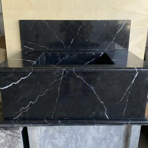 Handcarved Nero Marquina marble wall mounted sink by Marblyart, custom made to order — photo 11 of 13