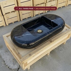 Handcarved Nero Marquina marble round vessel sink by Marblyart, custom made to order — photo 1 of 9