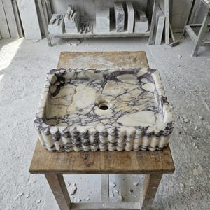 Handcarved Calacatta Viola marble vessel sink by Marblyart, custom made to order — photo 2 of 15