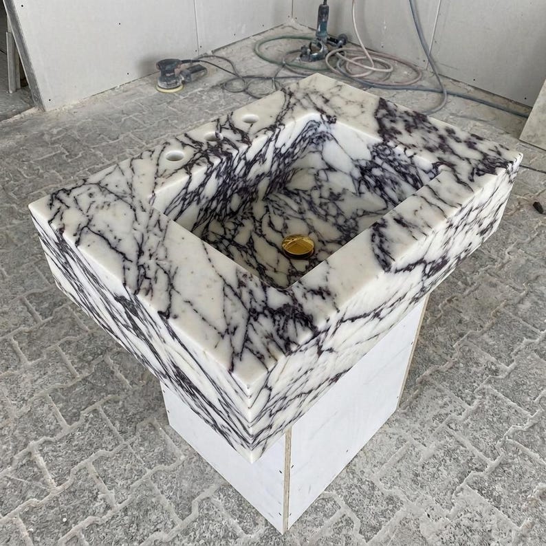 Calacatta Viola Marble wall mount sink — isometric three-quarter view (photo 9)