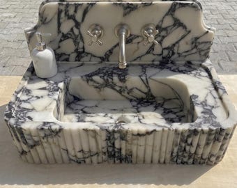Lavabo de mármol Calacatta Viola tallado a mano a medida, perfecto para tocadores de baño o como lavabo sobre encimera.