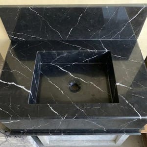 Handcarved Nero Marquina marble wall mounted sink by Marblyart, custom made to order — photo 7 of 13