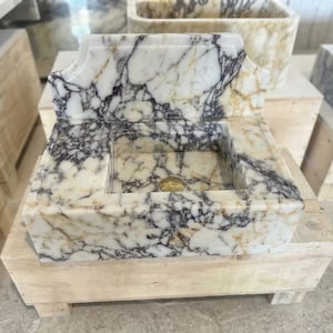Handcarved natural marble marble floating vanity sink by Marblyart, custom made to order — photo 2 of 11