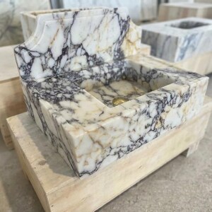 Handcarved natural marble marble floating vanity sink by Marblyart, custom made to order — photo 10 of 11