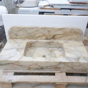 Handcarved Calacatta Gold marble floating vanity sink by Marblyart, custom made to order — photo 3 of 14