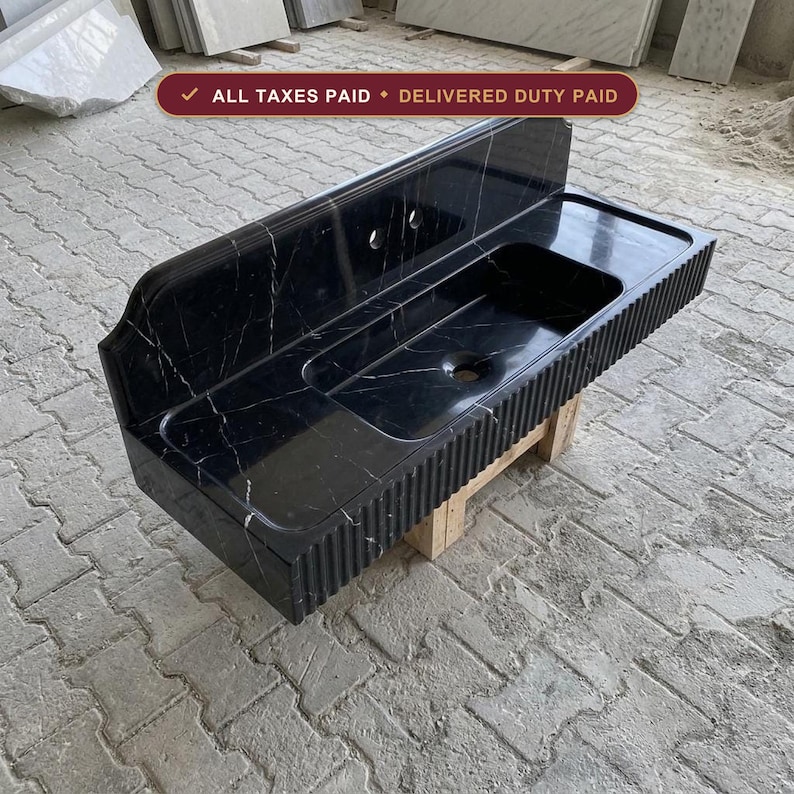Handcarved Nero Marquina marble floating vanity sink by Marblyart, custom made to order — photo 1 of 12
