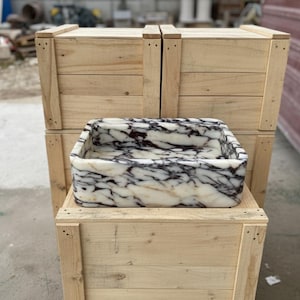 Handcarved Calacatta Viola marble wall mounted sink by Marblyart, custom made to order — photo 2 of 11