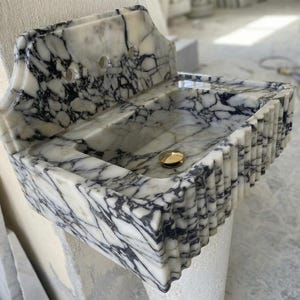 Handcarved natural marble marble floating vanity sink by Marblyart, custom made to order — photo 3 of 13