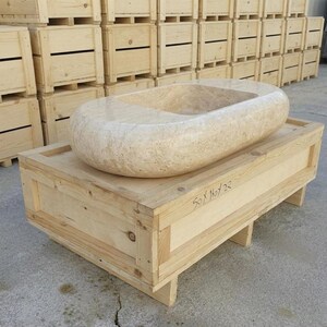 Beige Travertine fluted vessel sink — left side view (photo 4)