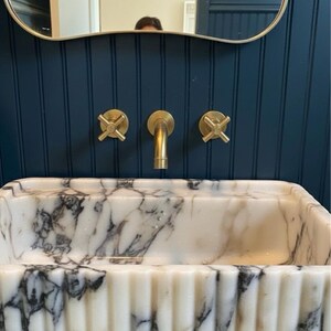 Handcarved Calacatta Viola marble wall mounted sink by Marblyart, custom made to order — photo 11 of 11