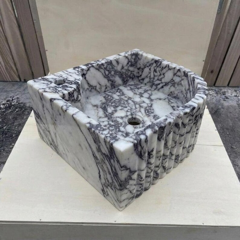 Calacatta Viola Marble fluted vessel sink — isometric three-quarter view (photo 9)