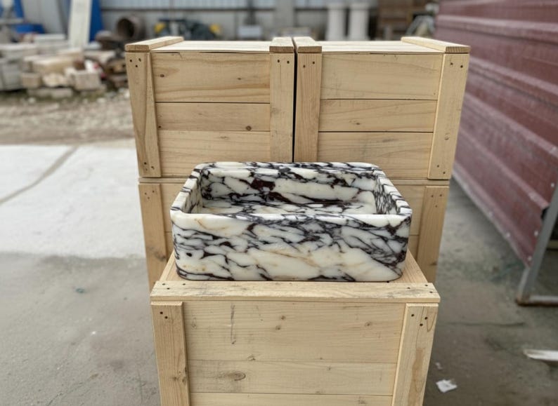 Handcarved Calacatta Viola marble wall mounted sink by Marblyart, custom made to order — photo 10 of 11