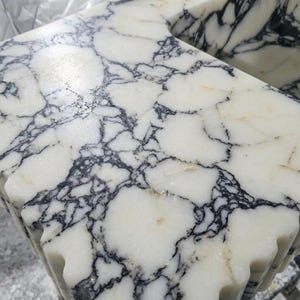 Calacatta Viola Marble wall mount sink — close-up of marble veining (photo 16)