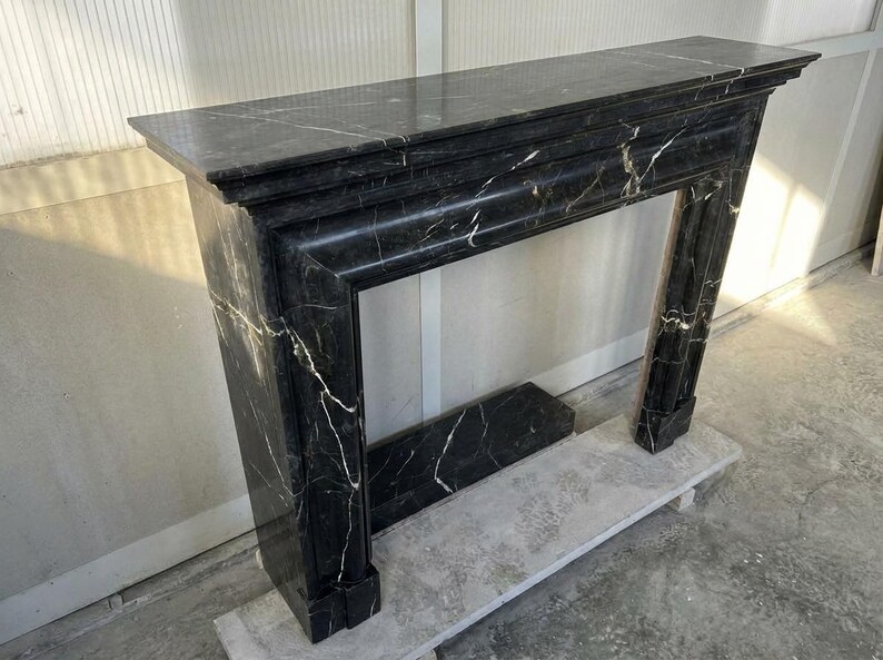 Handcarved Nero Marquina marble fireplace mantel by Marblyart, custom made to order — photo 7 of 11