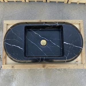 Nero Marquina Marble round vessel sink — top-down view (photo 6)
