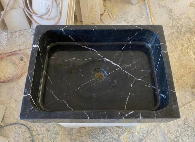 Handcarved Nero Marquina marble vessel sink by Marblyart, custom made to order — photo 4 of 13