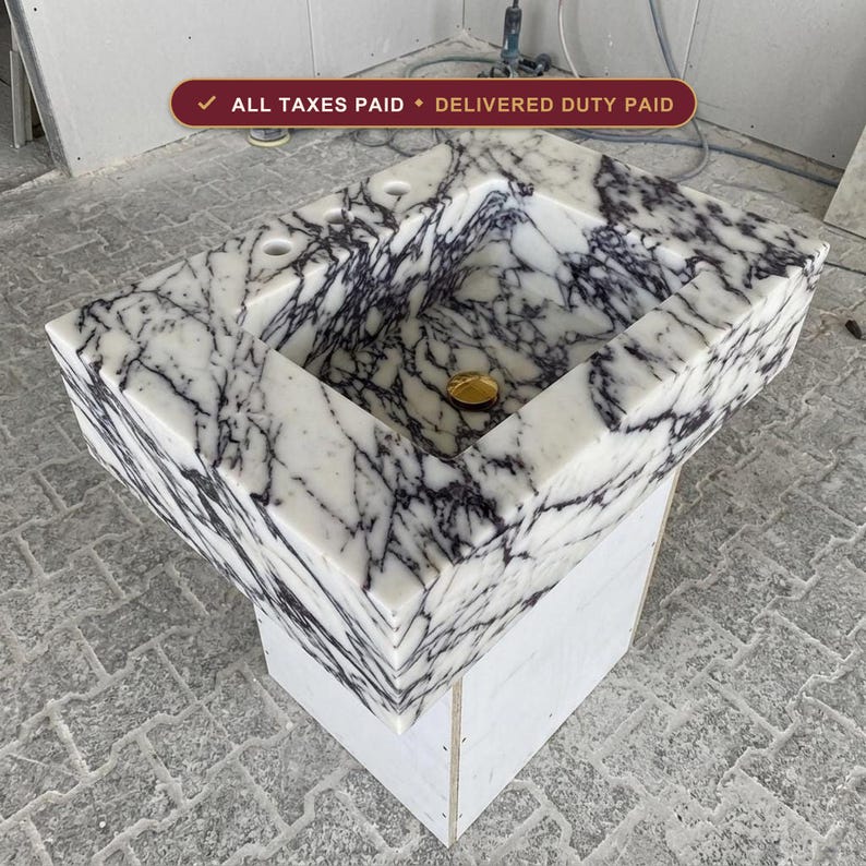Handcarved Calacatta Viola marble wall mounted sink by Marblyart, custom made to order — photo 1 of 11