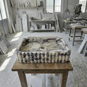 Handcarved Calacatta Viola marble vessel sink by Marblyart, custom made to order — photo 11 of 15
