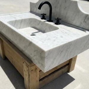 Handcarved Carrara marble floating vanity sink by Marblyart, custom made to order — photo 8 of 15