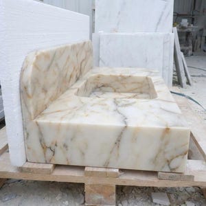 Handcarved Calacatta Gold marble floating vanity sink by Marblyart, custom made to order — photo 4 of 14