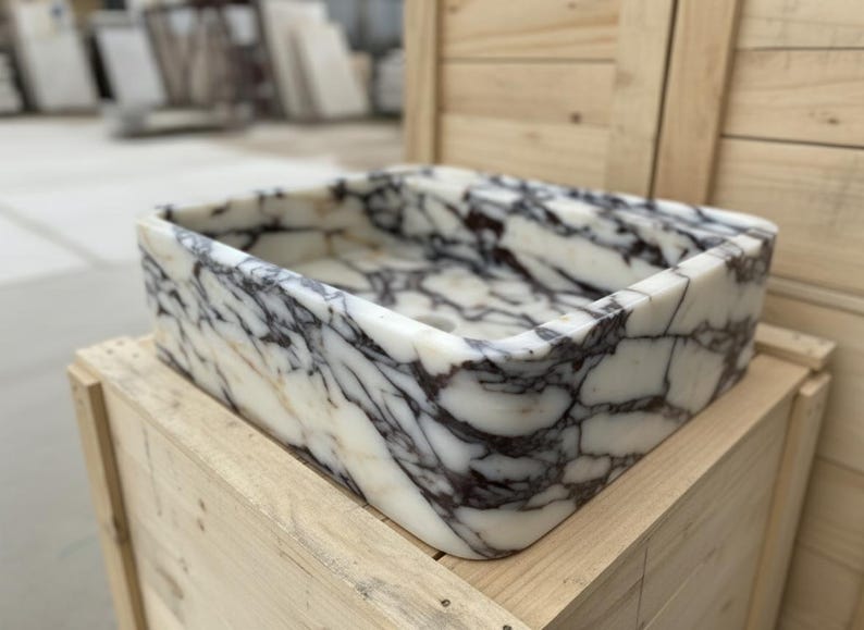 Handcarved Calacatta Viola marble wall mounted sink by Marblyart, custom made to order — photo 3 of 11