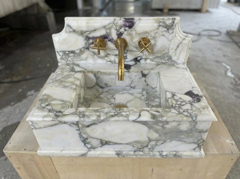 Handcarved Calacatta Monet marble wall mounted sink by Marblyart, custom made to order — photo 6 of 11