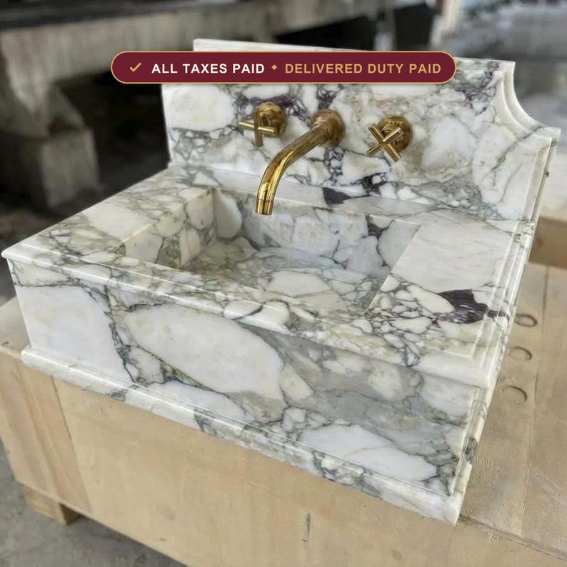 Handcarved Calacatta Monet marble wall mounted sink by Marblyart, custom made to order — photo 1 of 11