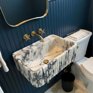 Handcarved Calacatta Viola marble wall mounted sink by Marblyart, custom made to order — photo 7 of 11