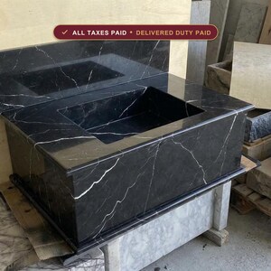 Handcarved Nero Marquina marble wall mounted sink by Marblyart, custom made to order — photo 1 of 13