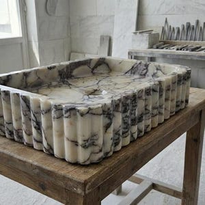 Handcarved Calacatta Viola marble vessel sink by Marblyart, custom made to order — photo 12 of 15
