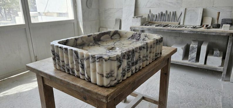 Handcarved Calacatta Viola marble vessel sink by Marblyart, custom made to order — photo 12 of 15