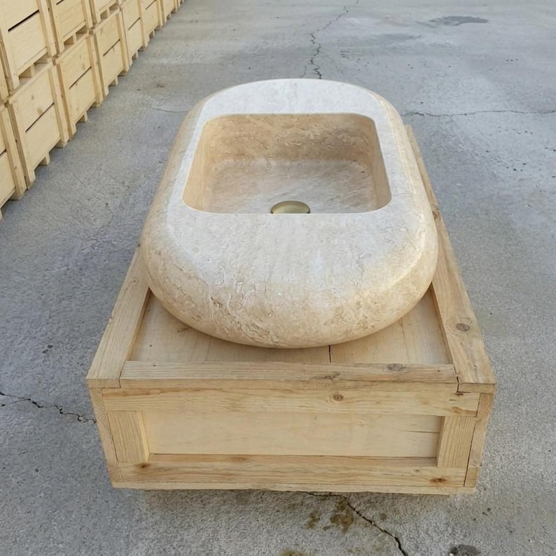Beige Travertine fluted vessel sink — front view (photo 2)