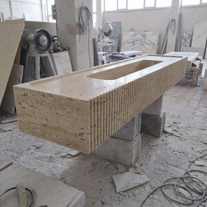 Beige Travertine fluted vessel sink — isometric three-quarter view (photo 6)