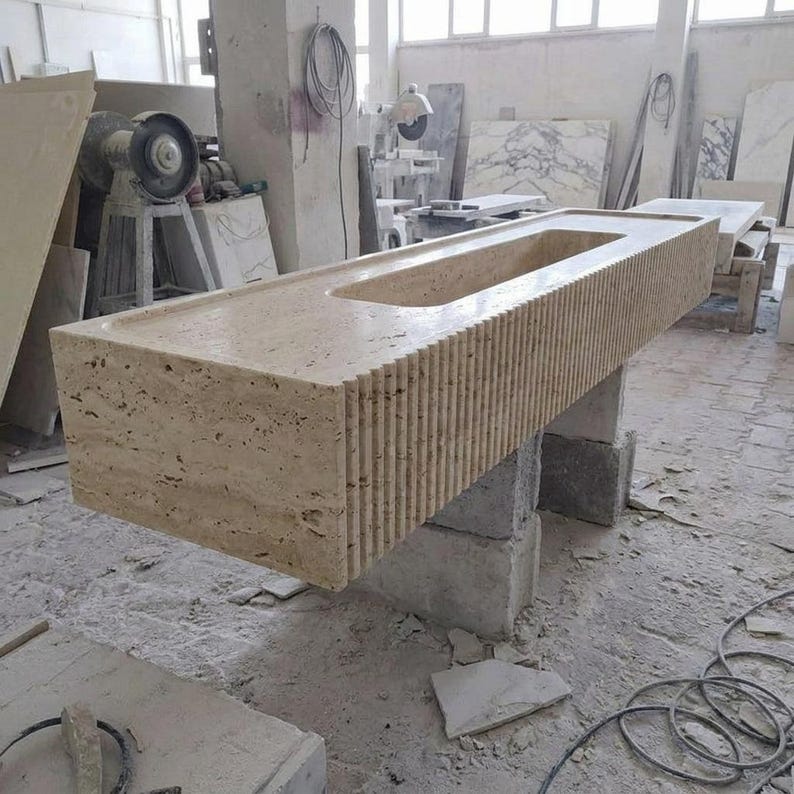 Beige Travertine fluted vessel sink — isometric three-quarter view (photo 6)