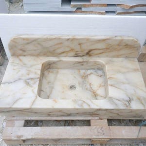 Handcarved Calacatta Gold marble floating vanity sink by Marblyart, custom made to order — photo 7 of 14