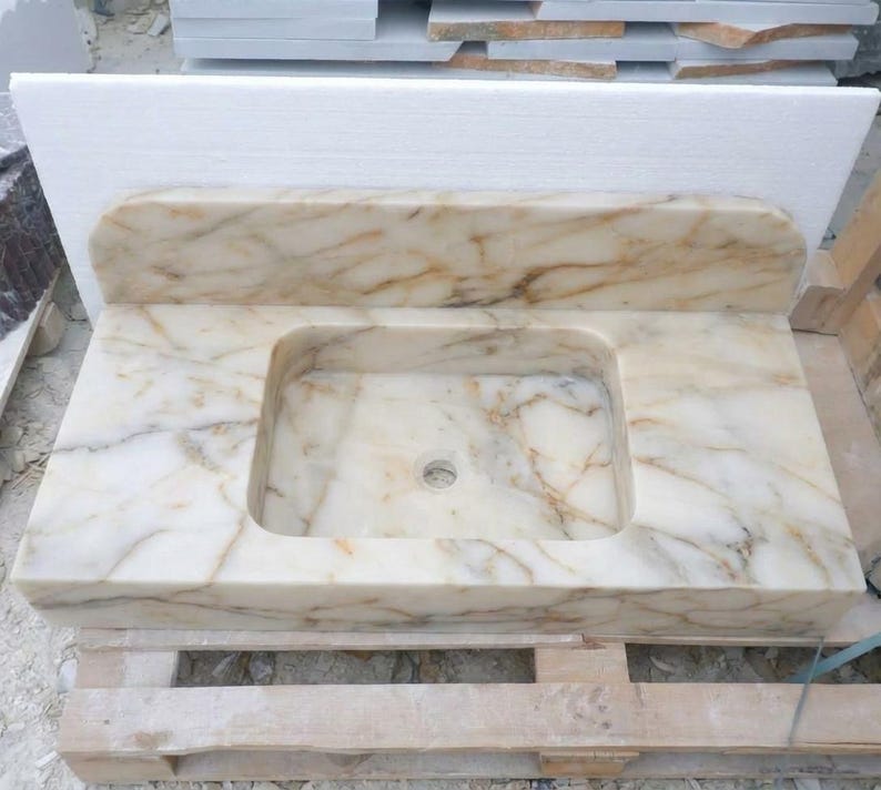 Handcarved Calacatta Gold marble floating vanity sink by Marblyart, custom made to order — photo 7 of 14
