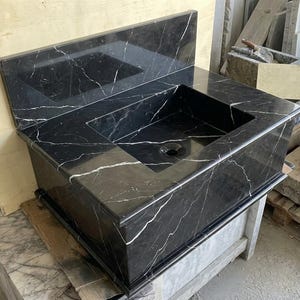 Handcarved Nero Marquina marble wall mounted sink by Marblyart, custom made to order — photo 9 of 13