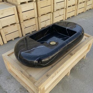 Nero Marquina Marble round vessel sink — isometric three-quarter view (photo 11)