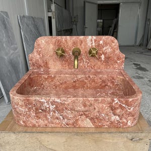 Red Travertine wall mount sink — eye-level view (photo 17)