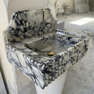 Handcarved natural marble marble floating vanity sink by Marblyart, custom made to order — photo 10 of 13